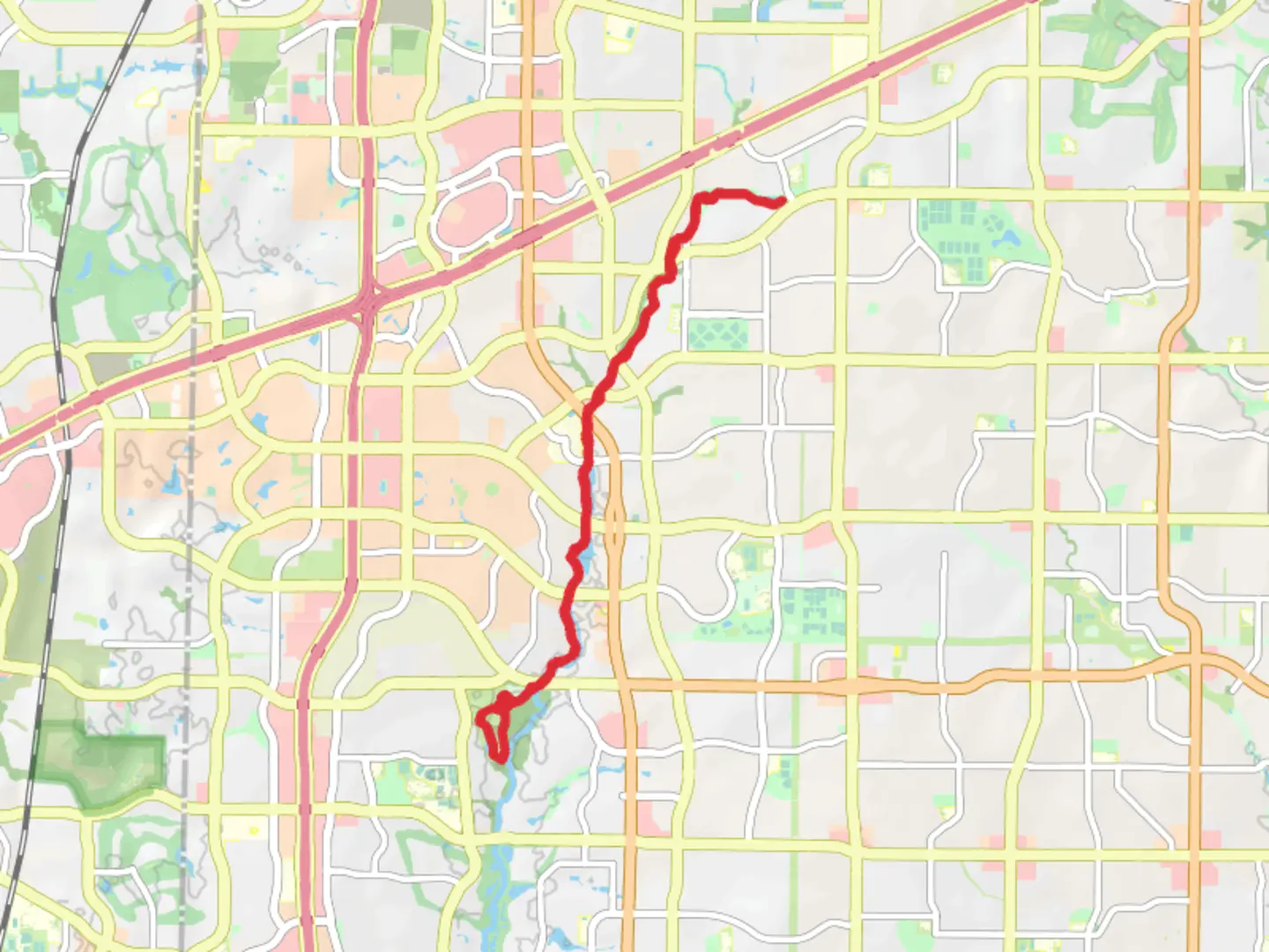 An image depicting the trail Windhaven Meadows Park and Legacy Trail and its surrounding area.