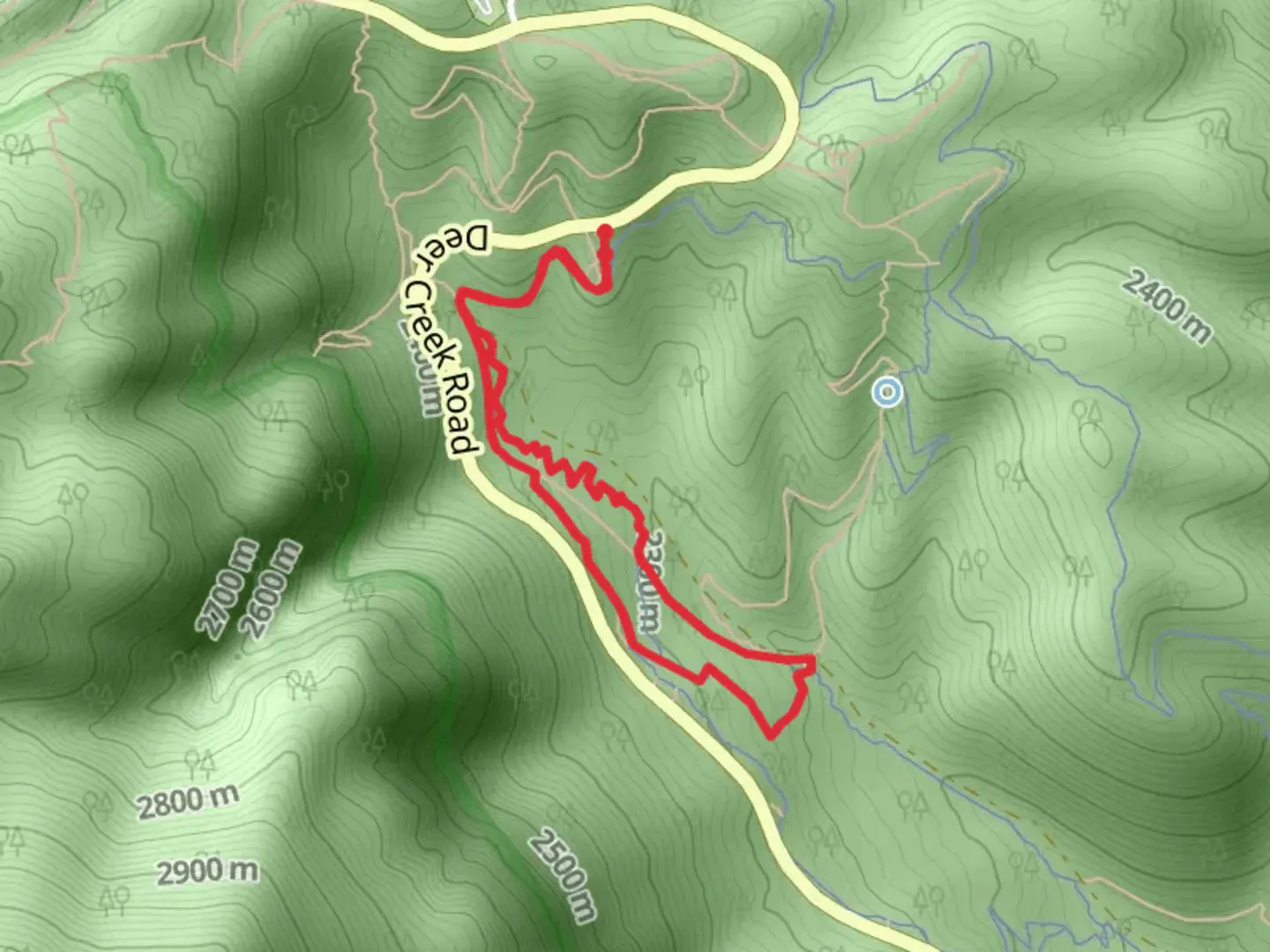 An image depicting the trail Tin Can Alley Loop and its surrounding area.
