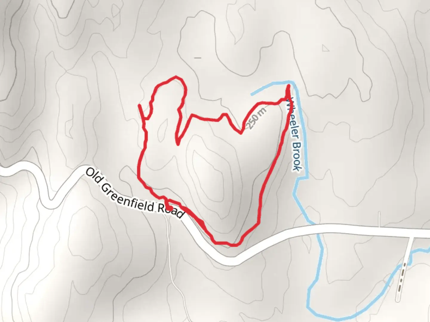 An image depicting the trail Wheeler Brook from Old Greenfield Road and its surrounding area.