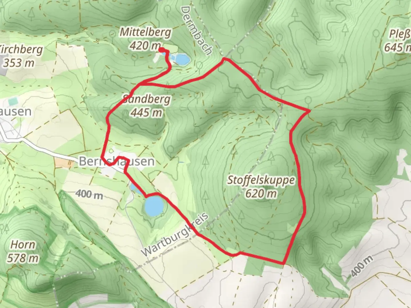 An image depicting the trail Bernsaeuser Kutte via Hochrhoener and Rhoen Rundweg Urnshausen and its surrounding area.
