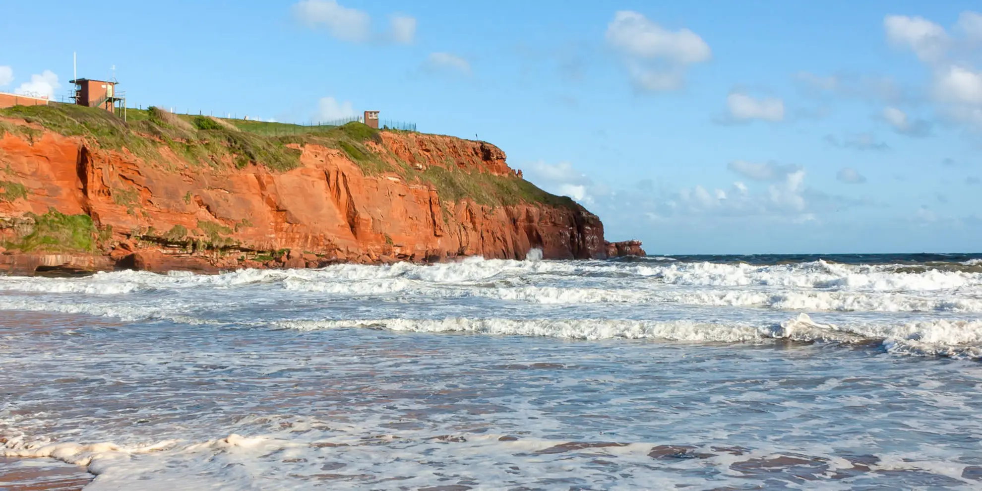 An image depicting the trail Devon Cliffs - West Down Beacon Walk and its surrounding area.