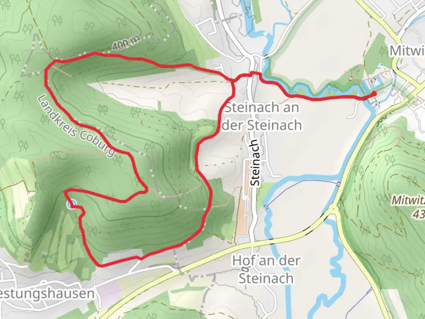 An image depicting the trail Klausenquellen Weg and its surrounding area.