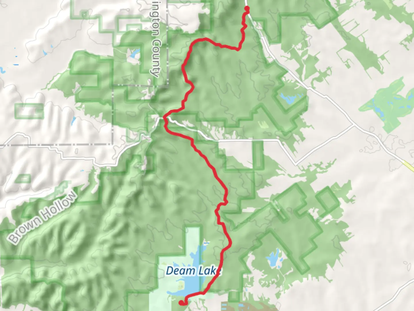An image depicting the trail Knobstone Trail, Round Knob and Deam Lake and its surrounding area.