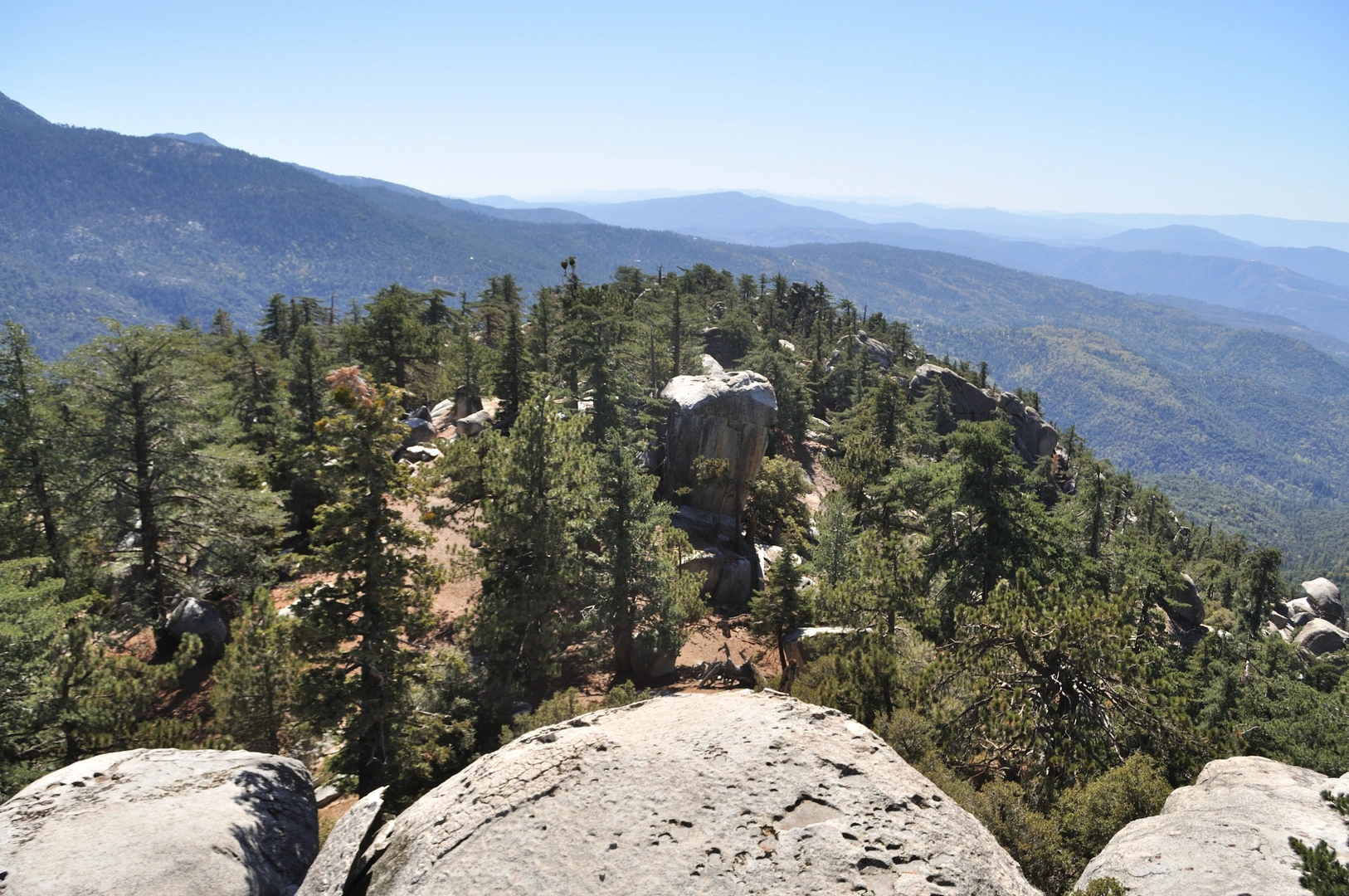 An image depicting the trail Black Mountain from Boulder Basin Campground and its surrounding area.