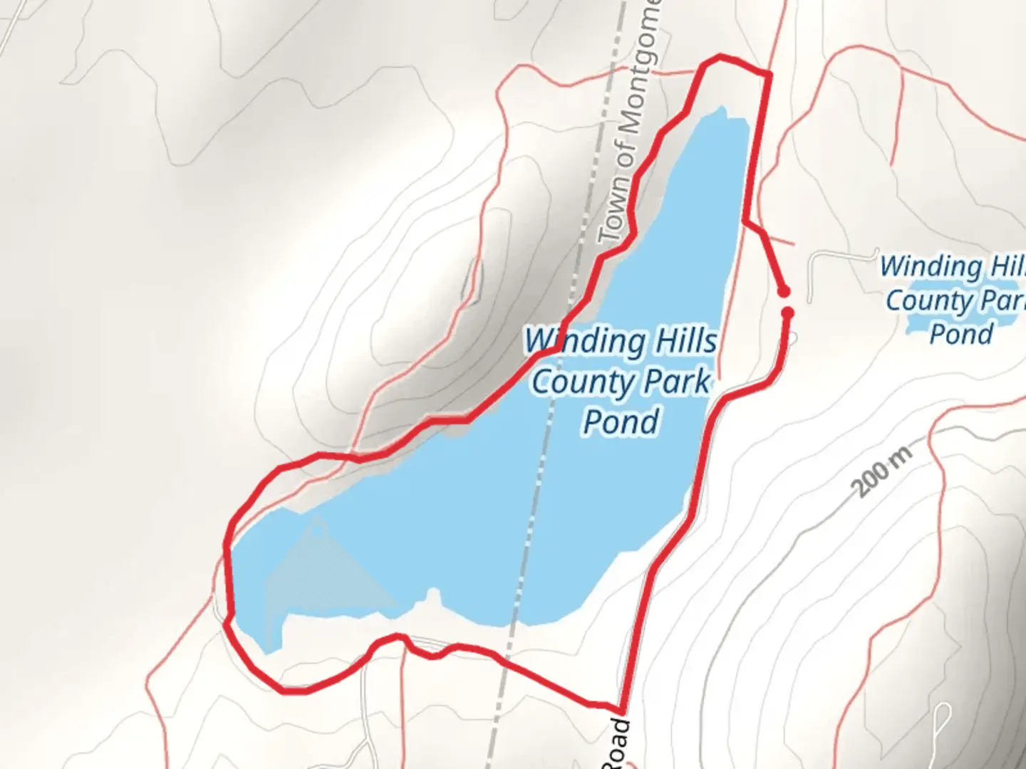 An image depicting the trail Winding Hills County Park Pond Loop and its surrounding area.