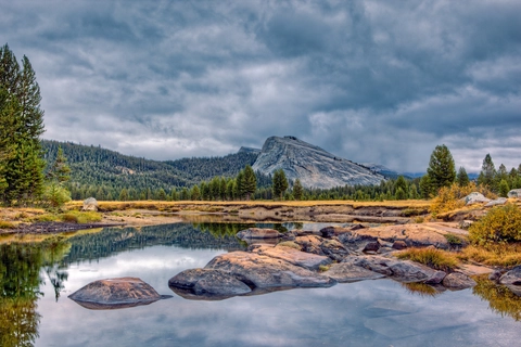 An image depicting the trail Lembert Dome Trail and its surrounding area.