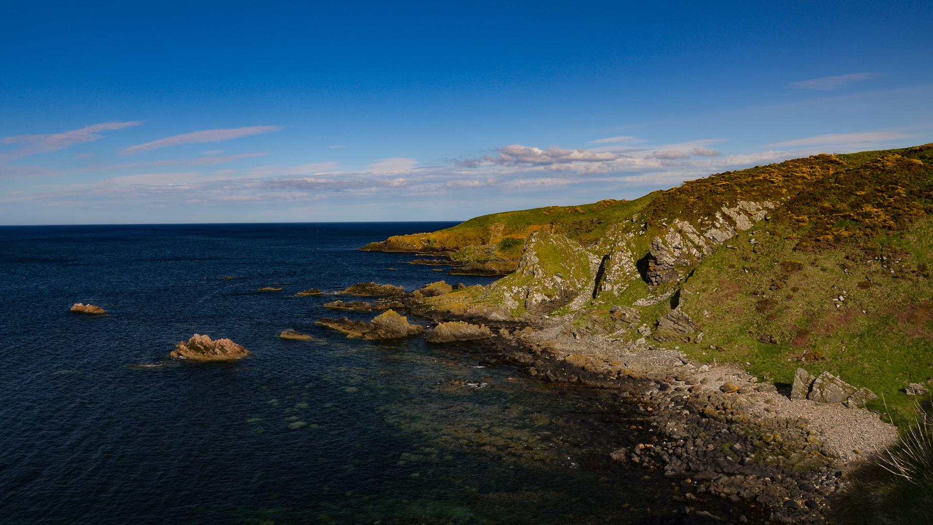 An image depicting the trail Moray Coast Trail and its surrounding area.