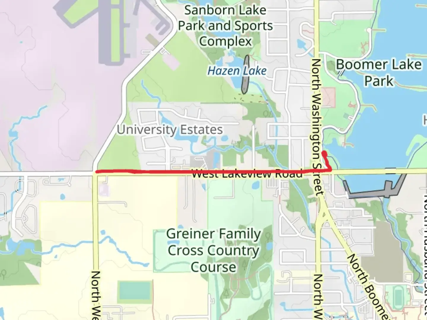 An image depicting the trail Walk beside West Lakeview Road - Boomer Lake and its surrounding area.