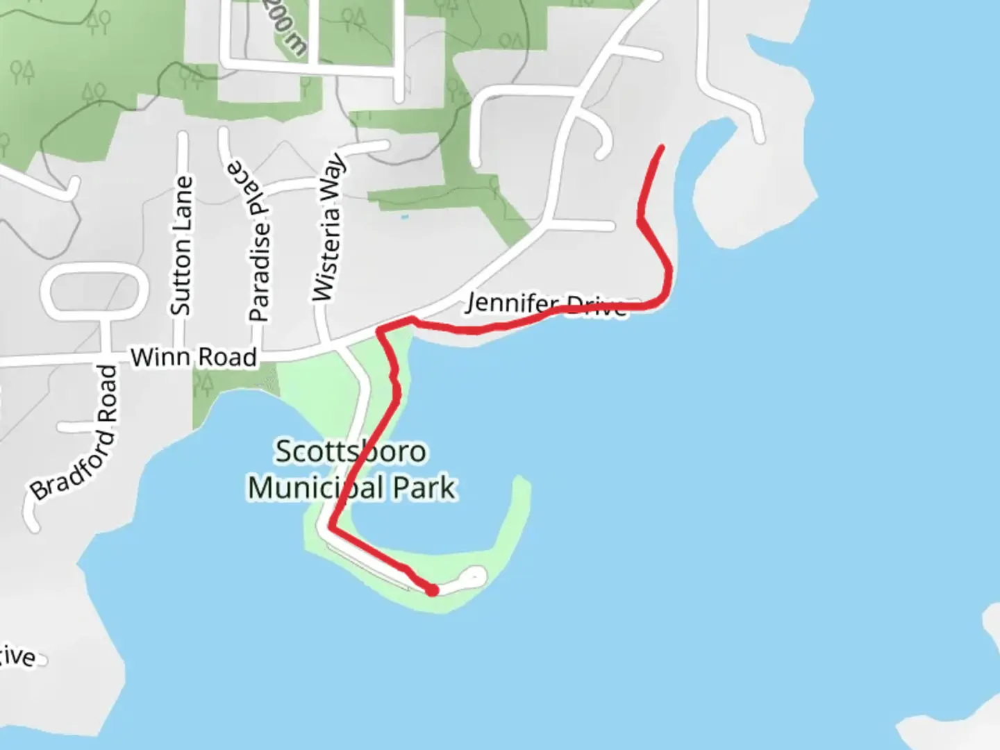 An image depicting the trail Scottsboro City Park Walking Trail and its surrounding area.