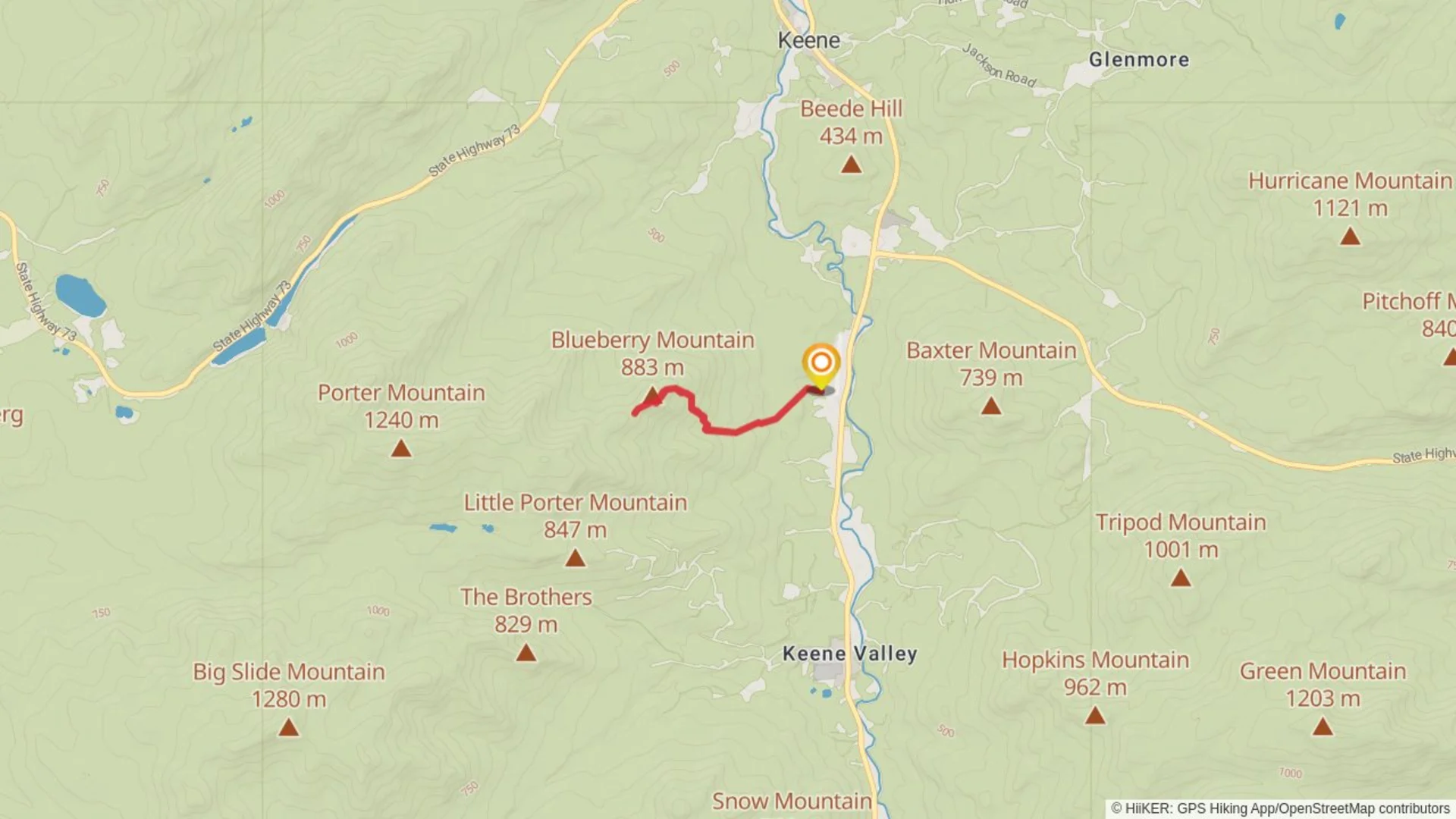 An image depicting the trail Blueberry Mountain via Porter Ridge Trail and its surrounding area.