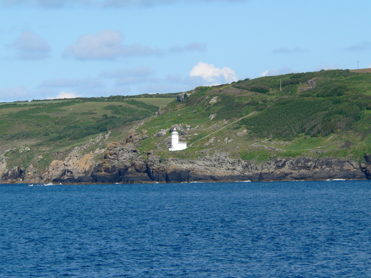 An image depicting the trail The Merry Maidens Walk and its surrounding area.