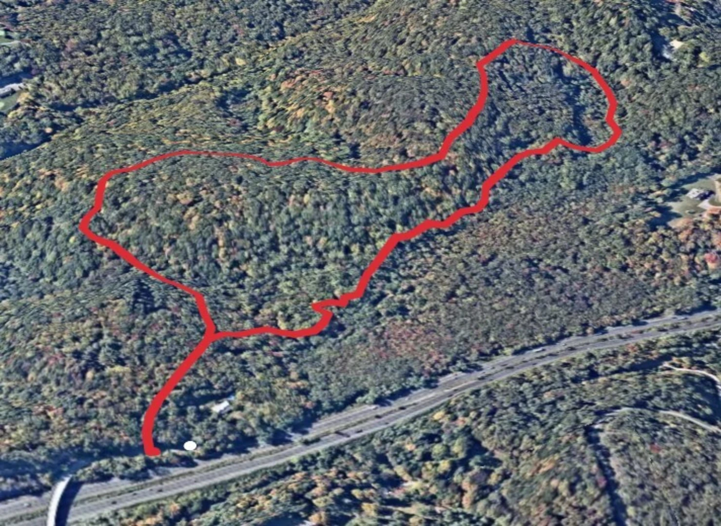 An image depicting the trail Butler Sanctuary Loop from Lake Bridge and its surrounding area.