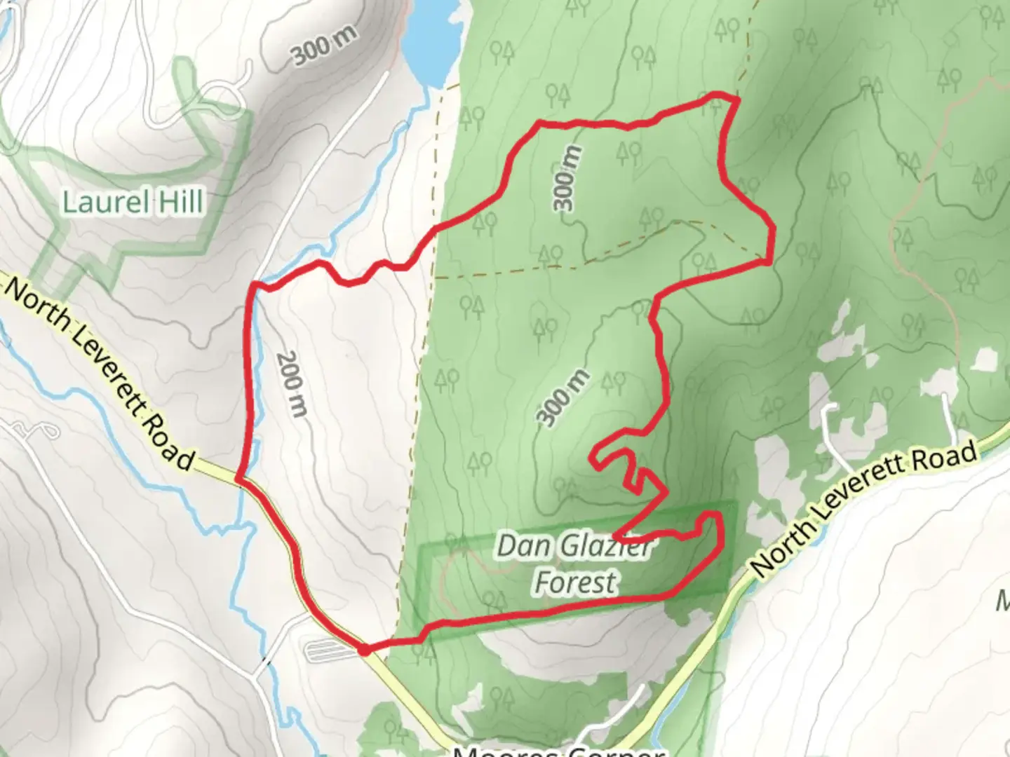 An image depicting the trail Dan Glazier Forest Loop via M and M Trail and its surrounding area.