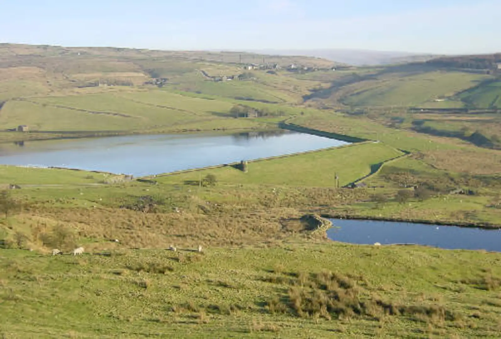 An image depicting the trail Mill Pond, Castleshaw Reservoir and Rigodunum Roman Fort Loop and its surrounding area.