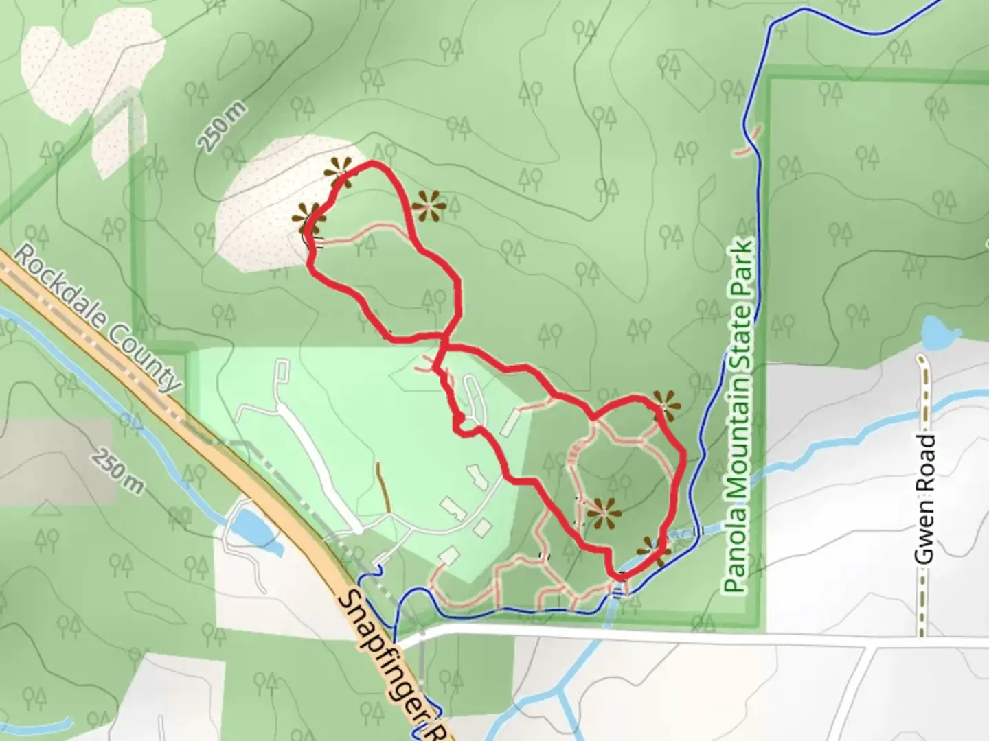 An image depicting the trail Rock Outcrop Trail and Watershed Loop Trail and its surrounding area.