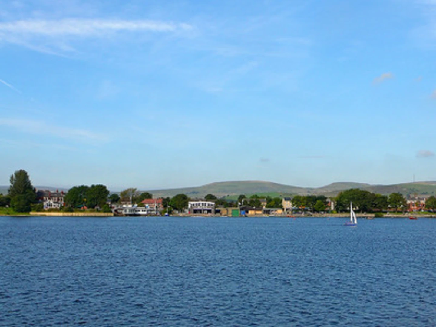 An image depicting the trail Hollingworth Lake Country Park Loop and its surrounding area.