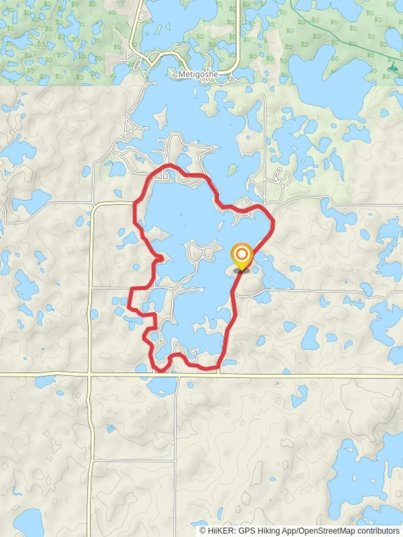 An image depicting the trail Lake Metigoshe Loop Path and its surrounding area.