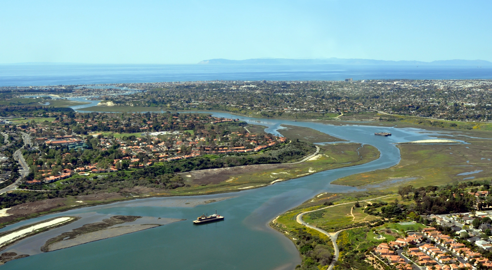 An image depicting the trail Walk along San Diego Creek via Back Bay Drive and its surrounding area.
