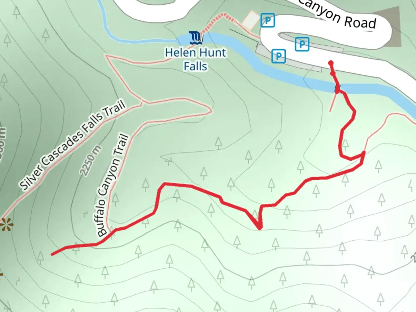 An image depicting the trail North Cheyenne Canyon Road and its surrounding area.