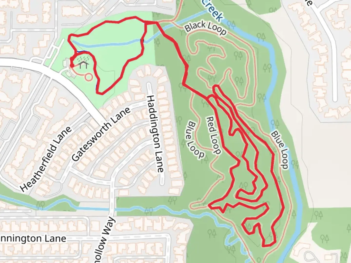 An image depicting the trail Katie Jackson Park and Red-Blue Loop and its surrounding area.