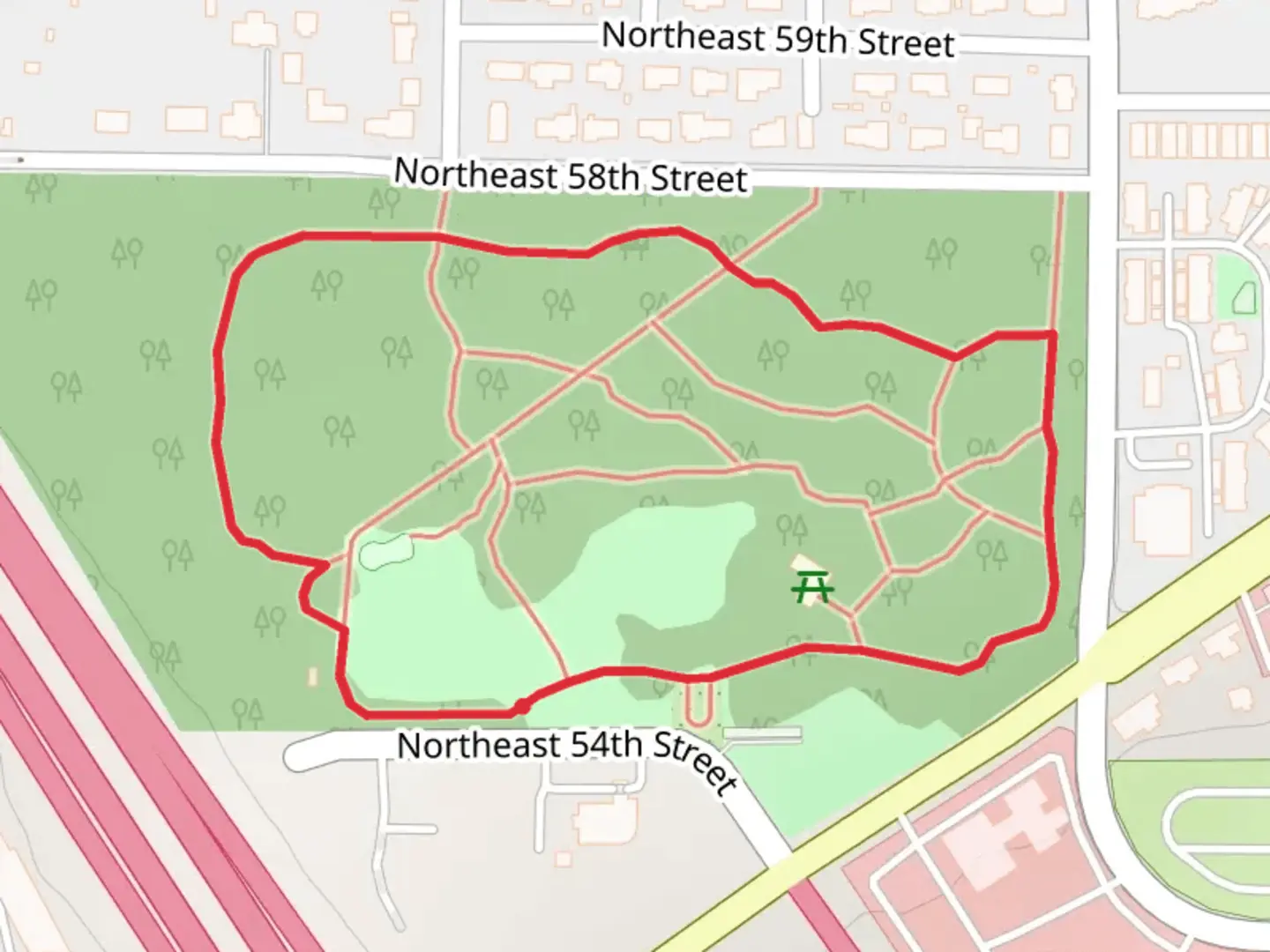 An image depicting the trail Orchards Community Park Loop and its surrounding area.