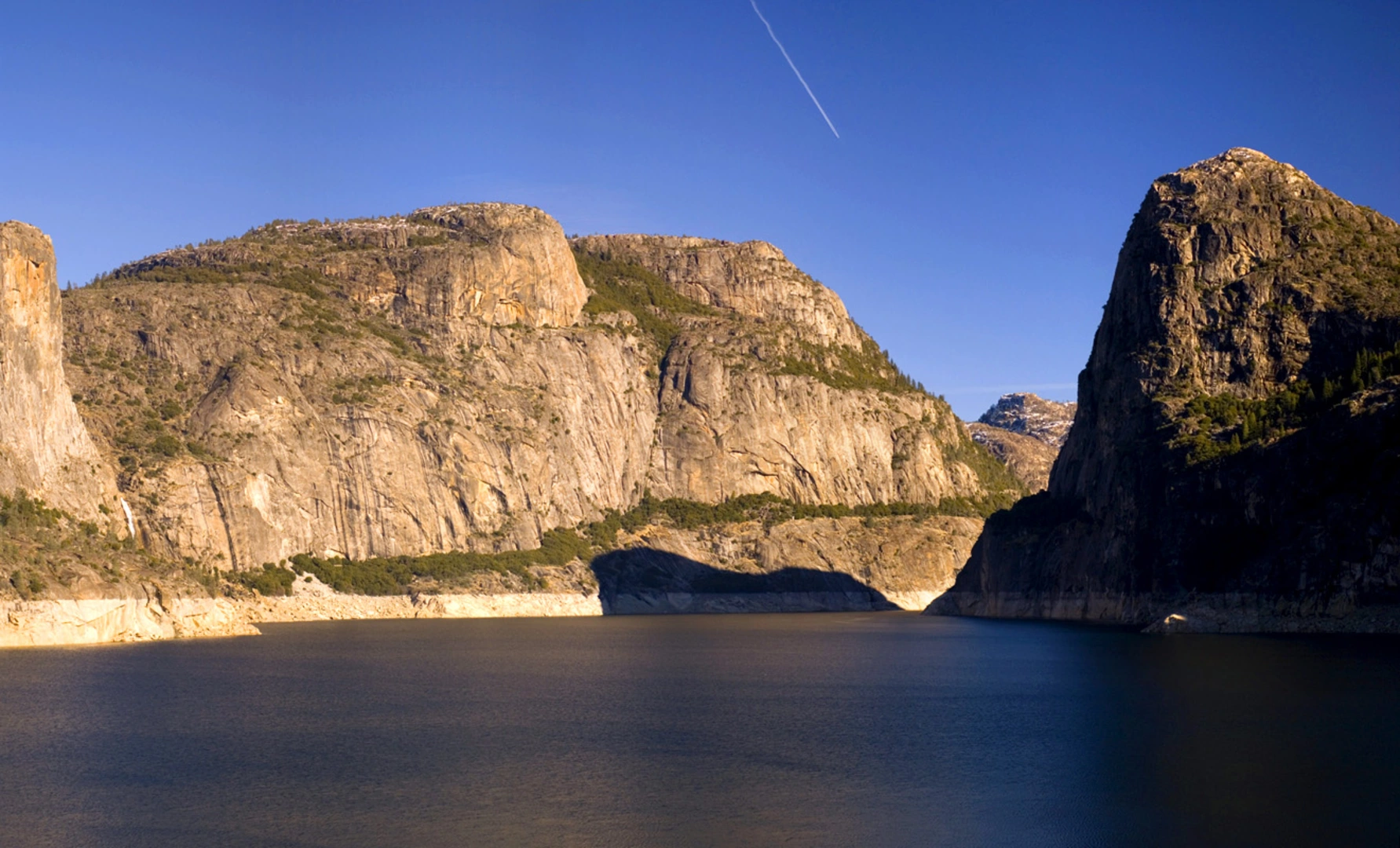 An image depicting the trail Miguel Meadow Fire Road - Hetch Hetchy Rerervoir and its surrounding area.