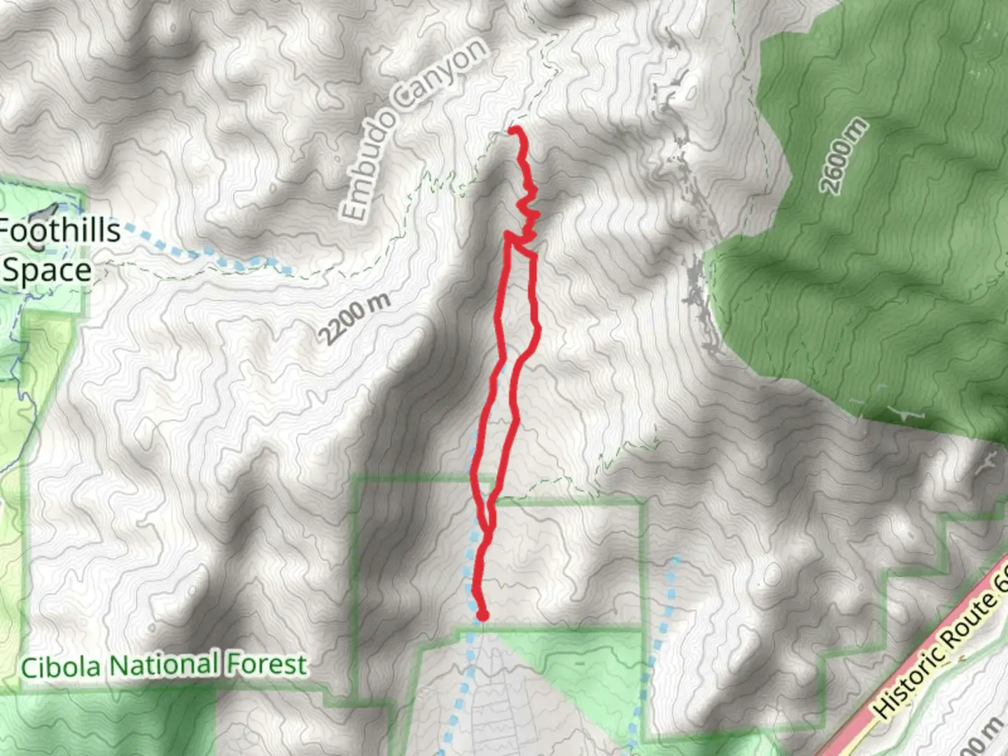 An image depicting the trail Three Gun Spring Trail Loop and its surrounding area.