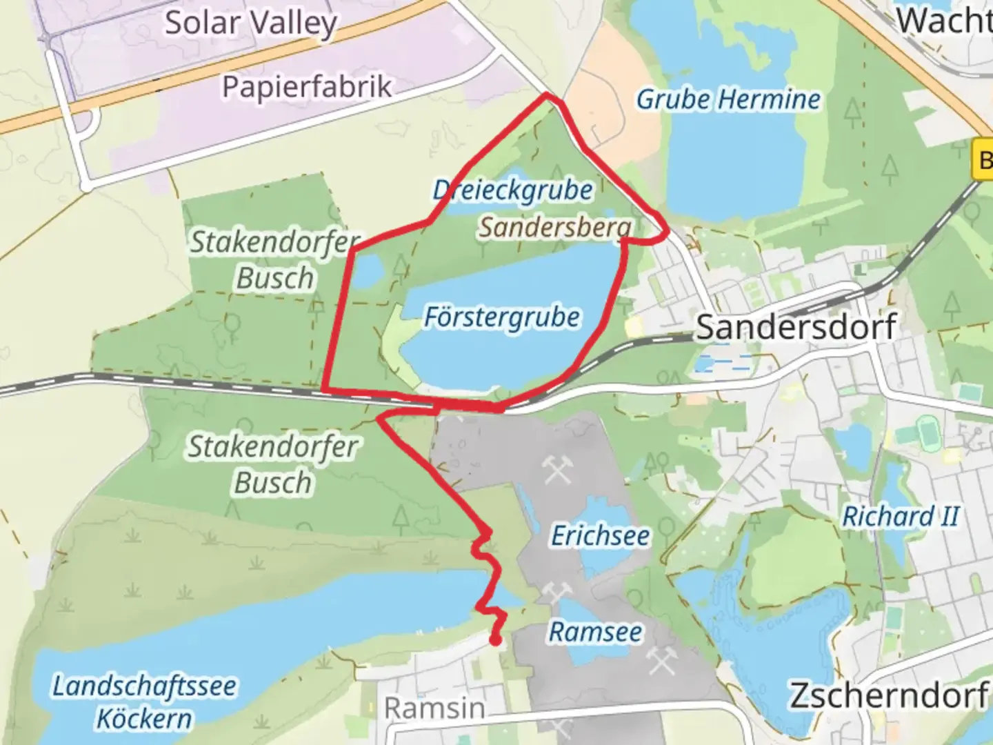 An image depicting the trail Förstergrube Loop via Landschaftssee Köckern and its surrounding area.