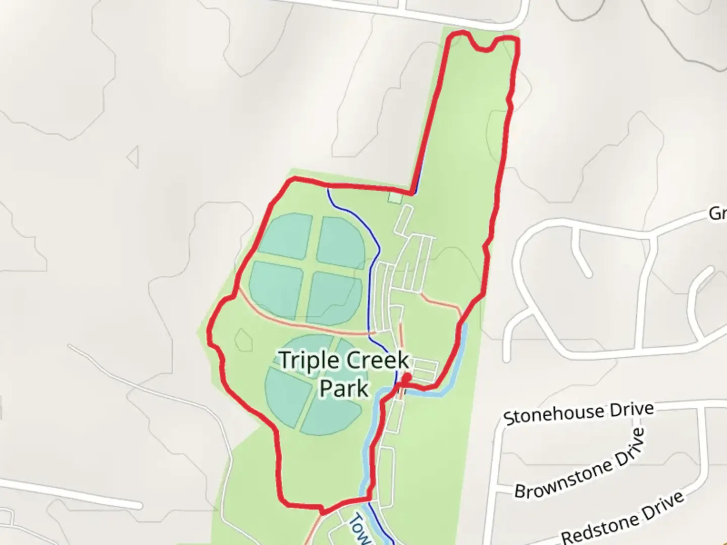 An image depicting the trail Triple Creek Greenway Loop and its surrounding area.