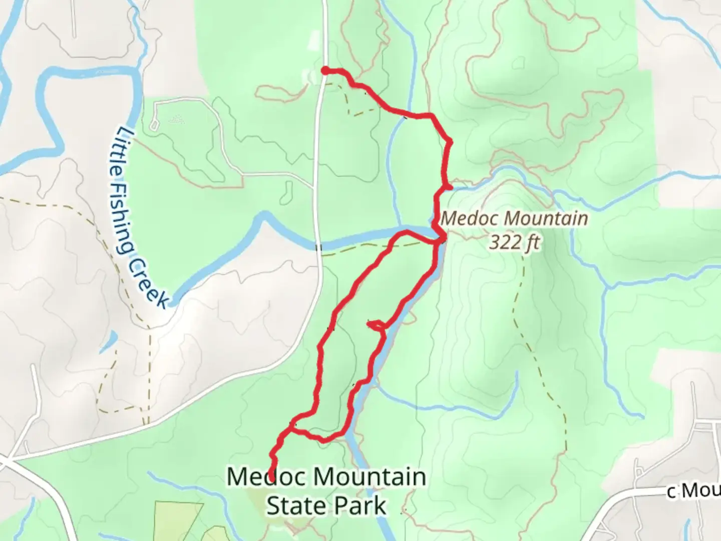 An image depicting the trail Medoc State Park Loop and its surrounding area.
