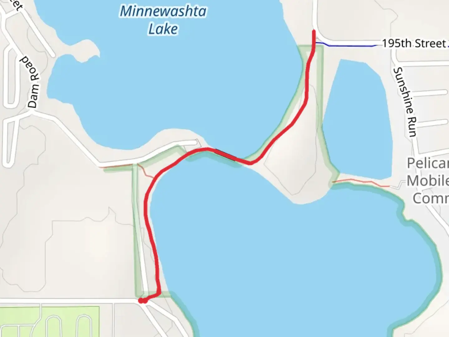 An image depicting the trail Iowa Great Lakes Trail and its surrounding area.