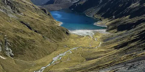 An image depicting the trail Nelson Lakes - Robert Ridge - Travers Sabine Circuit - Blue lakes - WAIAU Pass and its surrounding area.