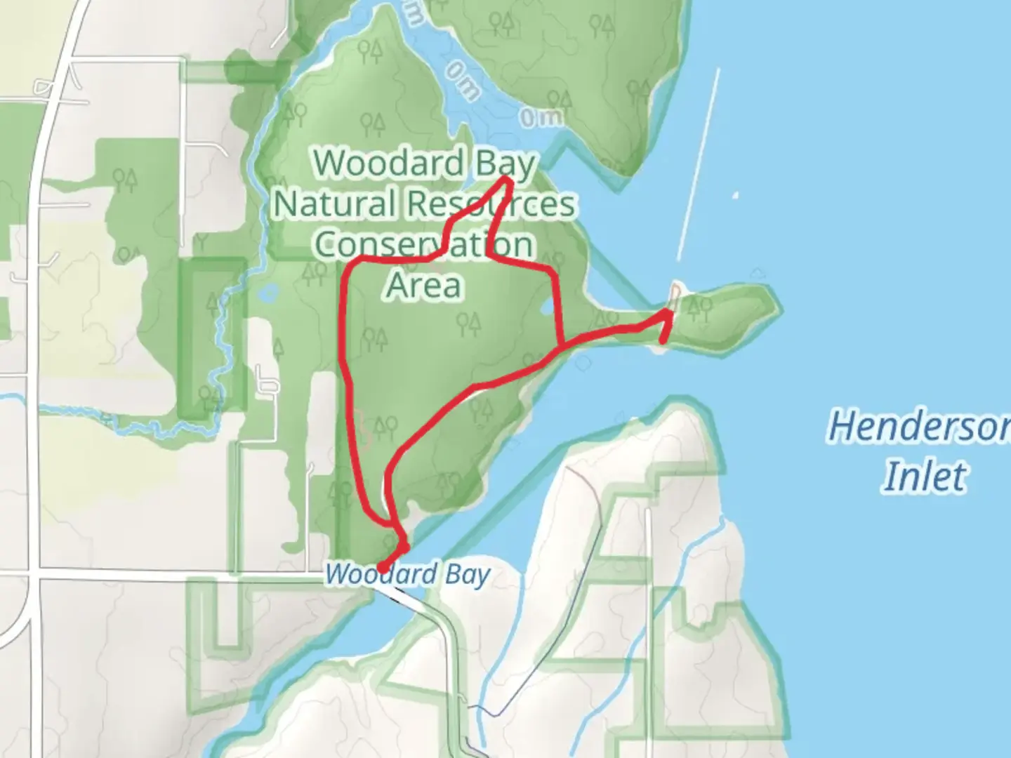 An image depicting the trail Woodard Bay Loop Trail and its surrounding area.