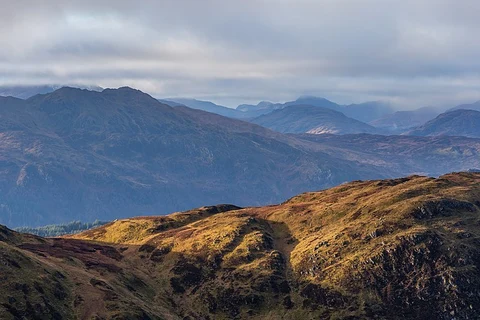 An image depicting the trail Ardnandave Hill and Ben Ledi Loop from Garbh Uisgh Bridge and its surrounding area.