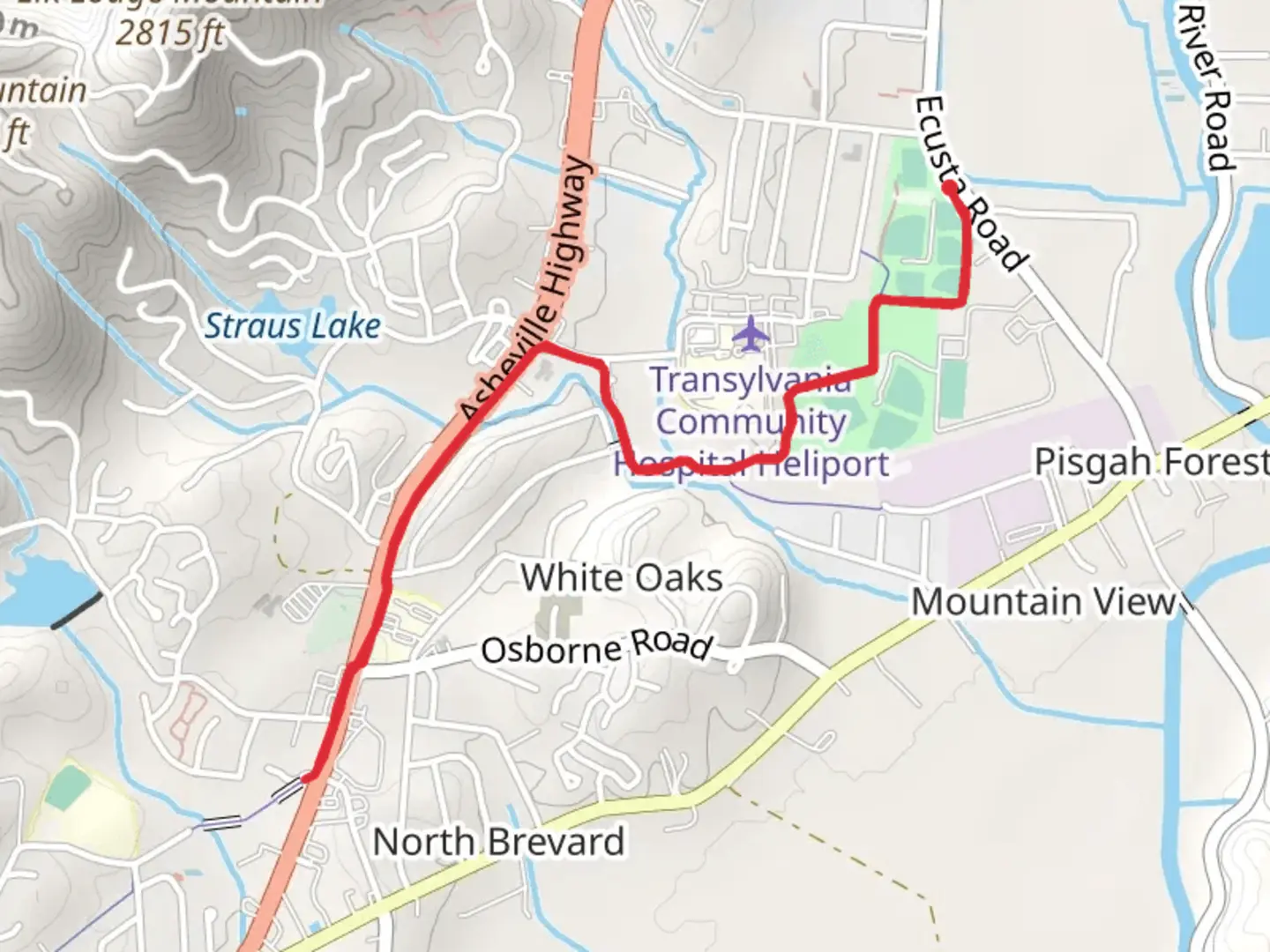 An image depicting the trail Brevard Greenway and its surrounding area.