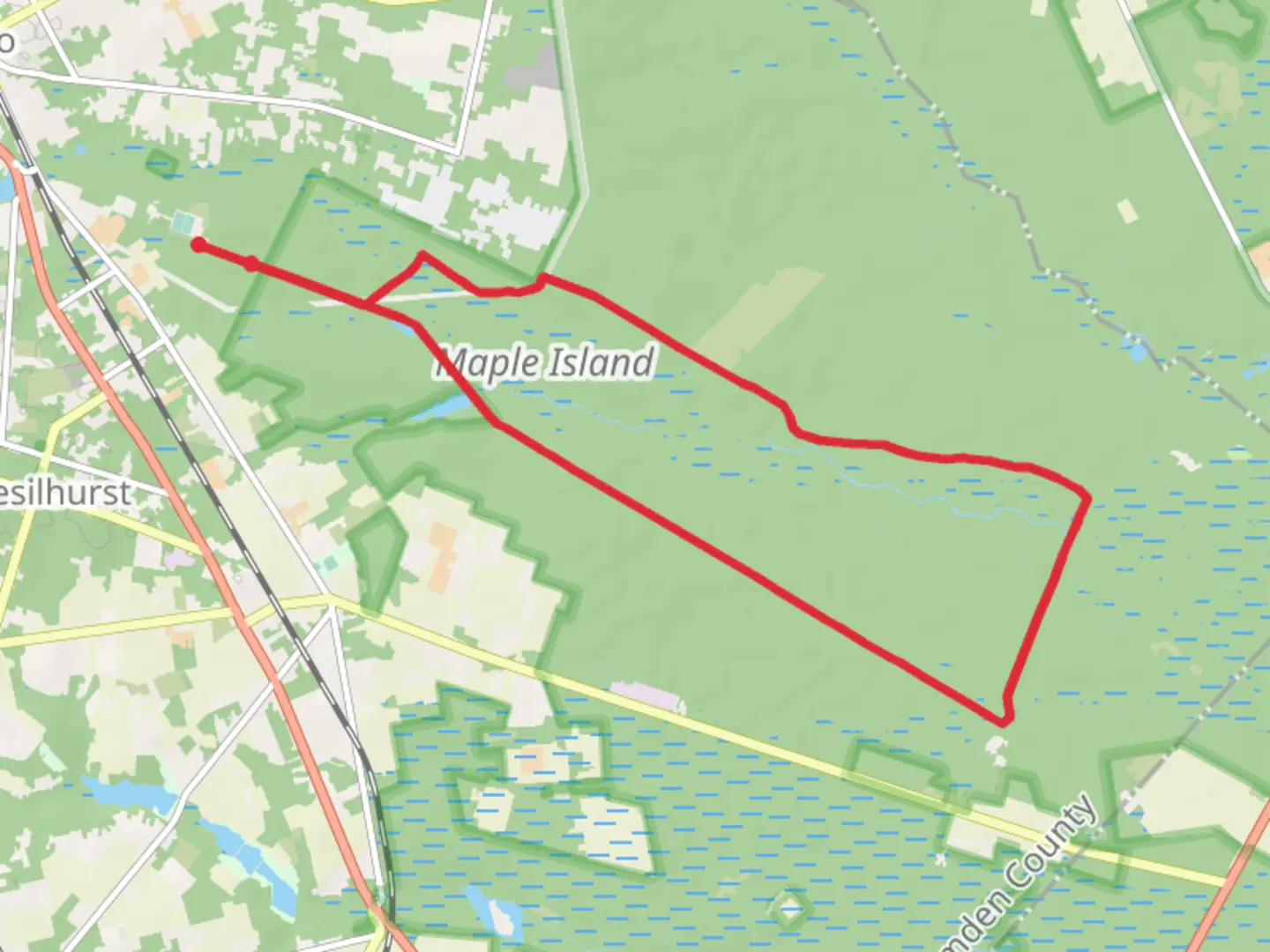 An image depicting the trail Burnt Mill Red Loop Trail and its surrounding area.