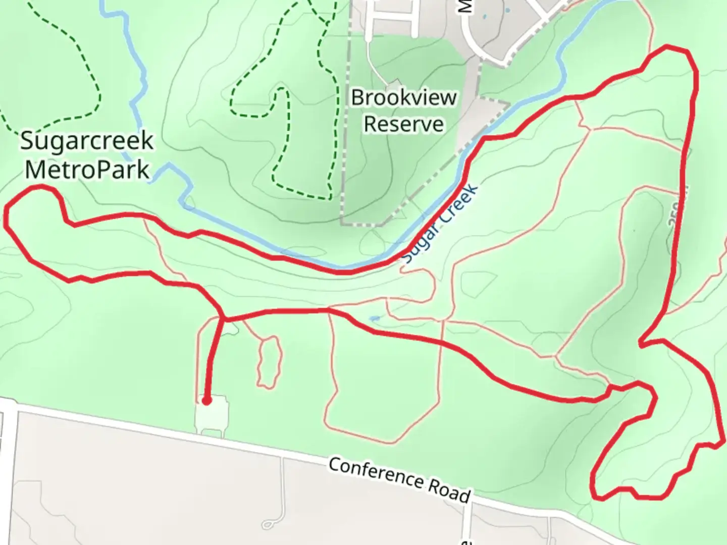 An image depicting the trail Sugarcreek MetroPark Green Trail Loop and its surrounding area.