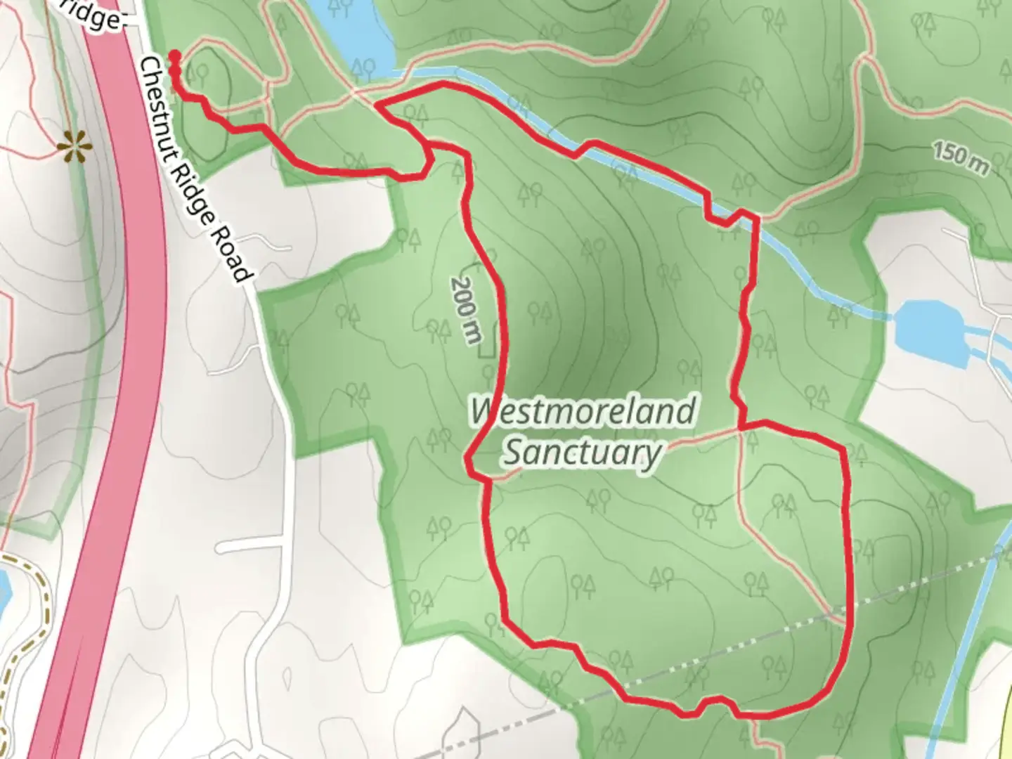 An image depicting the trail Westmoreland Sanctuary from Chestnut Ridge Road and its surrounding area.