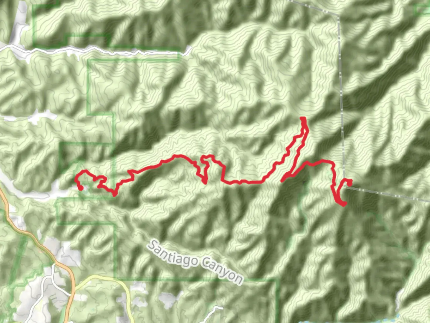 An image depicting the trail Flores Peak to Santiago Peak Trail and its surrounding area.