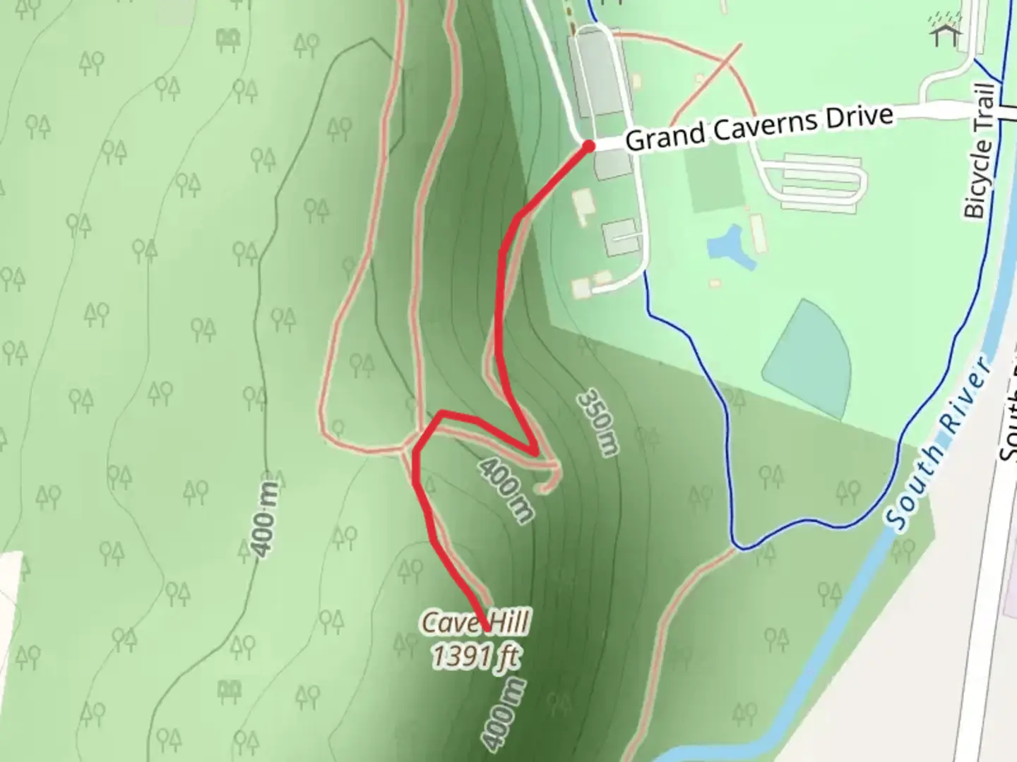 An image depicting the trail Cave Hill from Grand Caverns Drive and its surrounding area.