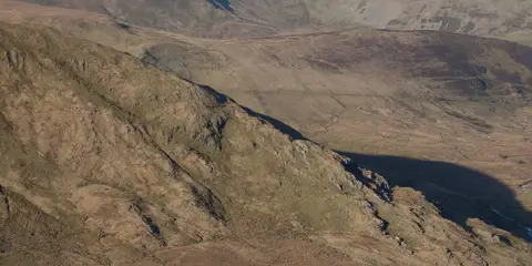An image depicting the trail Moel Eilio and Moel Cynghorion from Llanberis and its surrounding area.