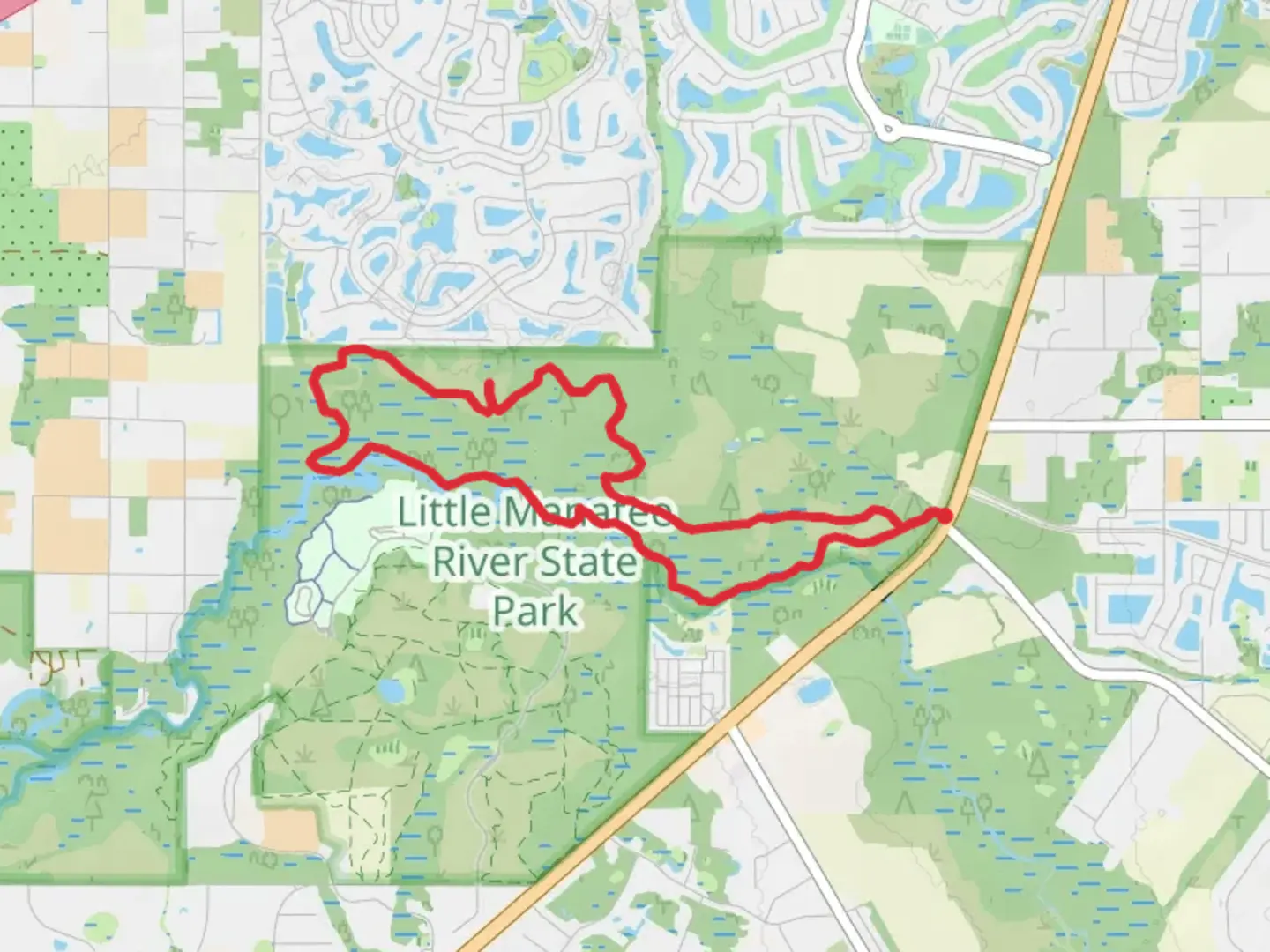 An image depicting the trail Little Manatee River State Park Loop Trail and its surrounding area.