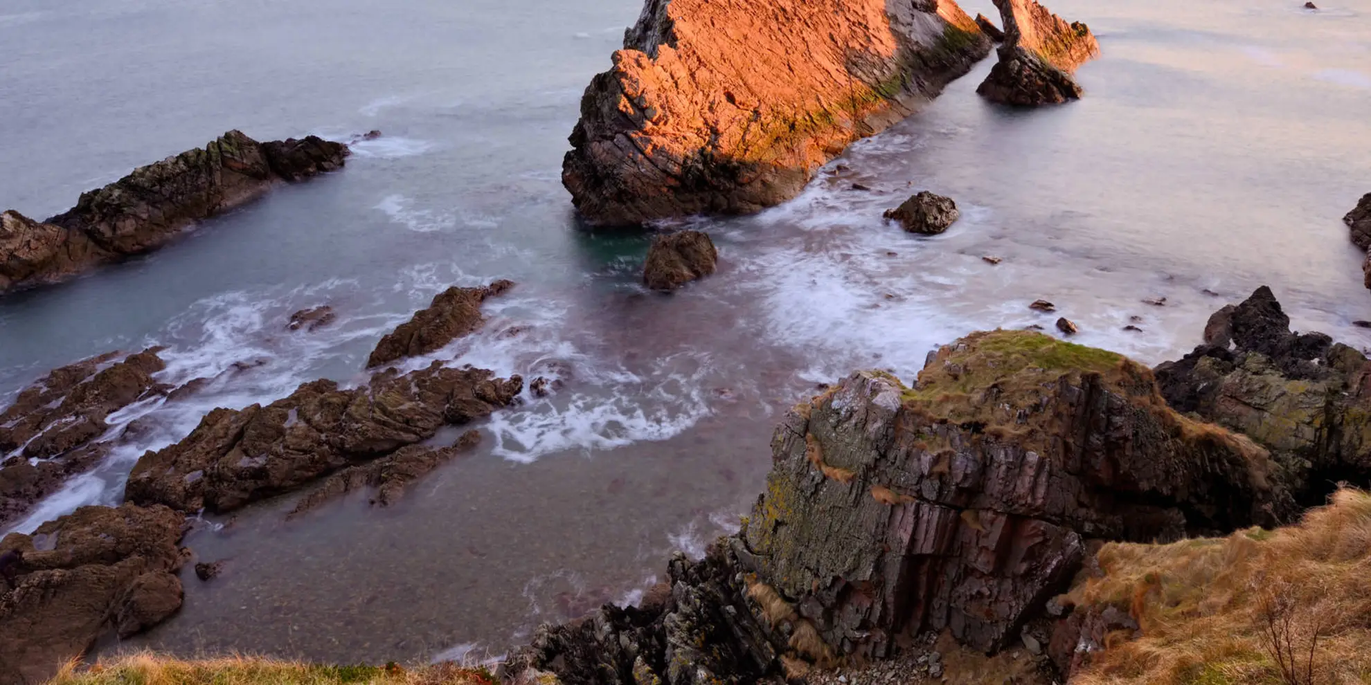 An image depicting the trail Portsoy via Portknockie Cliffs Path and its surrounding area.