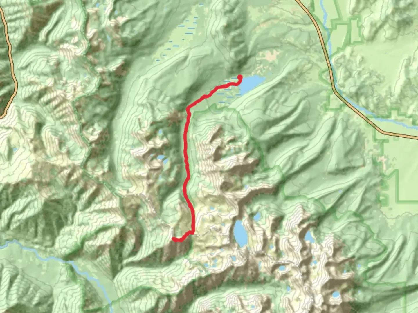 An image depicting the trail Observation Peak via Iron Creek-Stanley Lake Trail and its surrounding area.