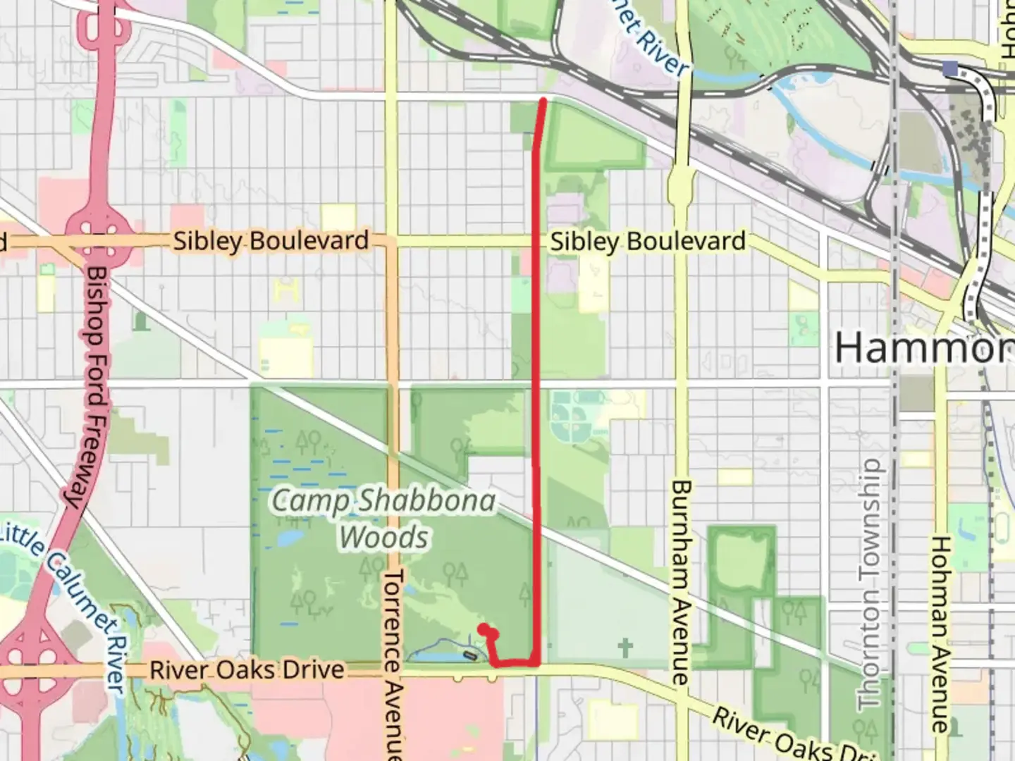 An image depicting the trail Burnham Greenway Red Paved Trail and its surrounding area.