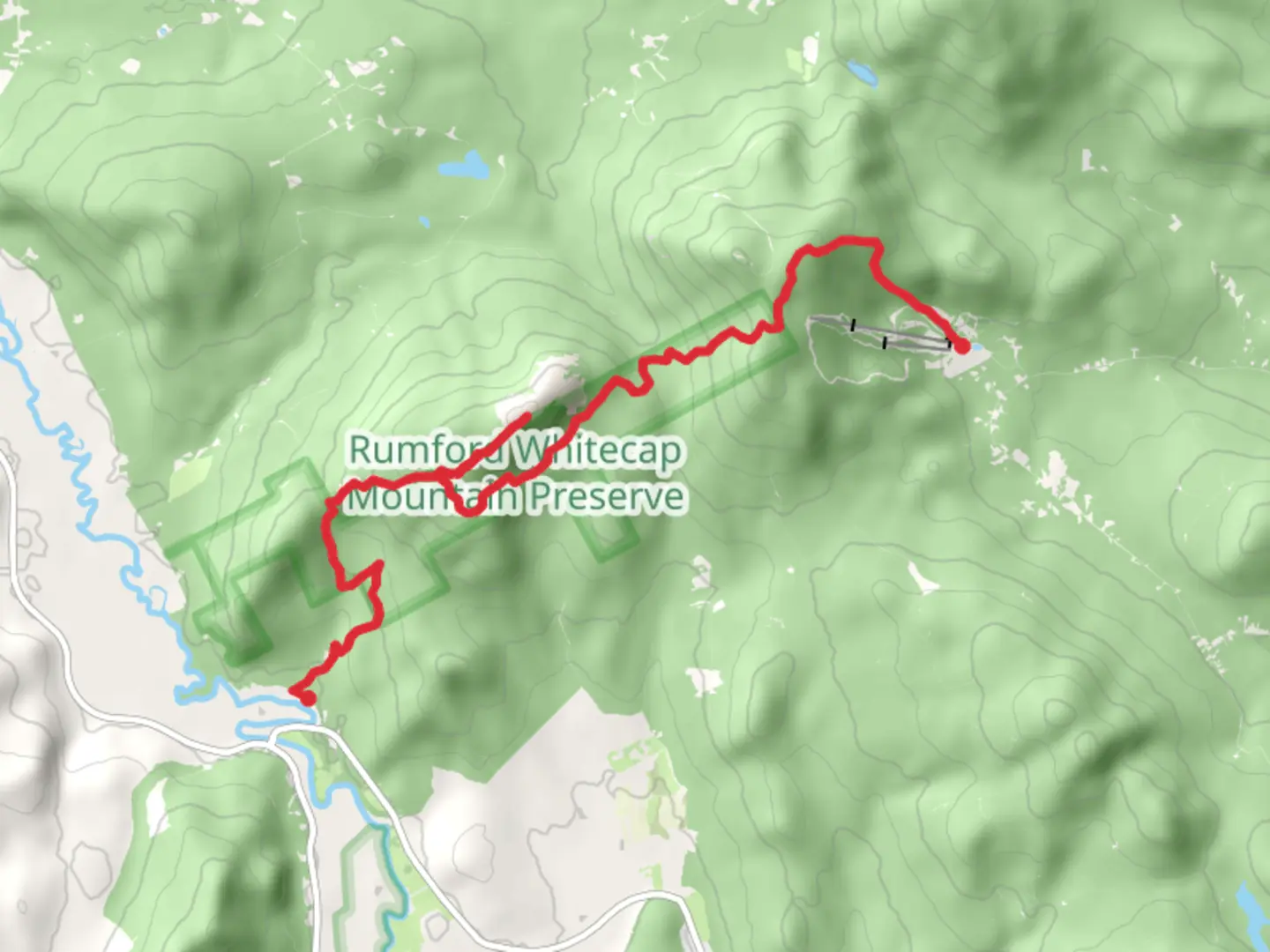 An image depicting the trail Whitecap Mountain to Novice Double Trail and its surrounding area.