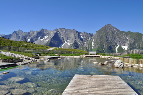 An image depicting the trail Stoderzinken - Ahornsee Lake - Weißenbach Trail and its surrounding area.