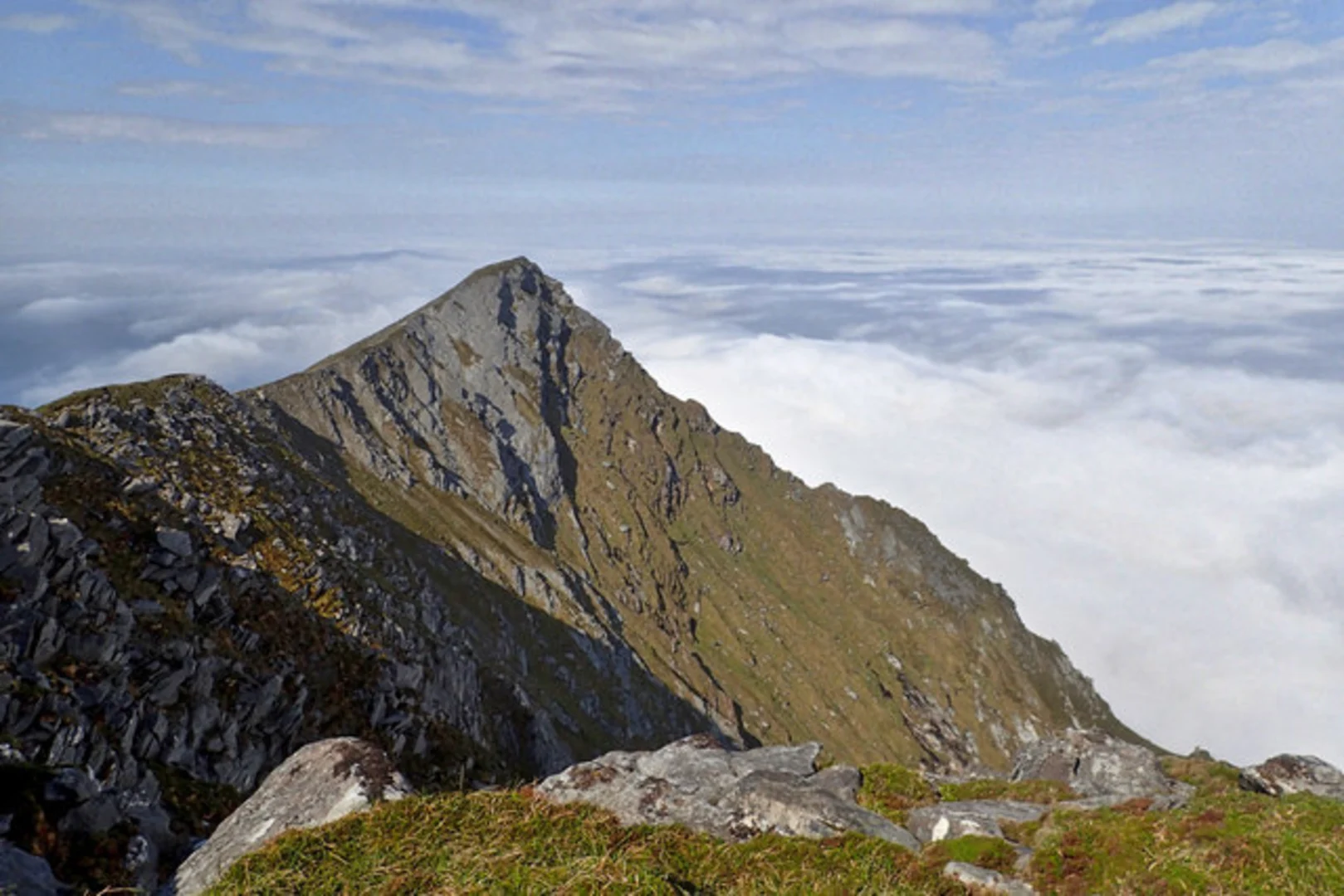 An image depicting the trail Croaghaun Summits Loop and its surrounding area.