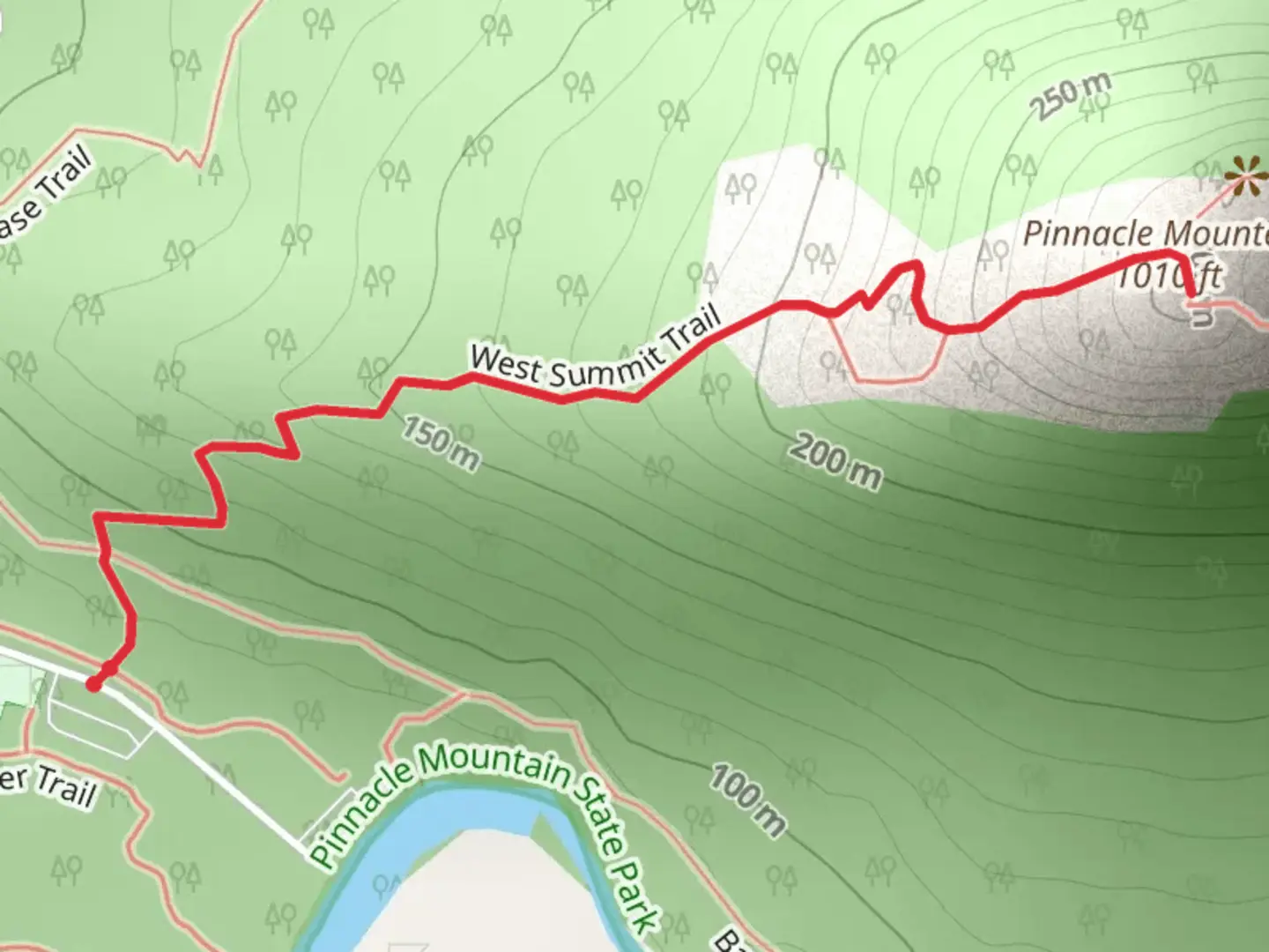 An image depicting the trail Pinnacle Mountain via West Summit Trail and its surrounding area.