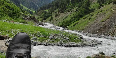 An image depicting the trail Kugti Pass Trek and its surrounding area.
